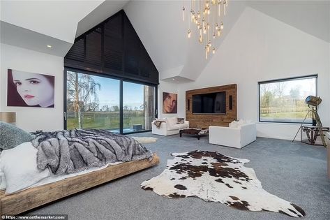 Cristiano Ronaldo flies into UK by private jet and sets up home before his Manchester United debut  | Daily Mail Online Ronaldo House, Cristiano Ronaldo House, Manchester House, Manchester Home, Luxurious Mansion, Expensive Homes, Large Open Plan Kitchens, Cristiano Ronaldo Manchester, Large Baths