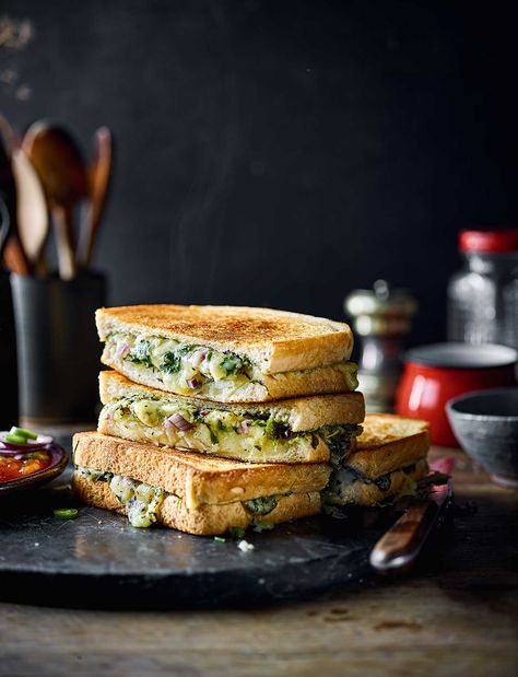 These Indian-style cheese and potato toasties are based on vada pav – a Mumbai speciality of battered potato fritters sandwiched with fresh chutneys including coriander and mint Curry Recipes Vegetarian, Potato Fritters, Budget Recipes, Vegetarian Curry, Grilled Sandwich, Indian Recipes, Cookies Ingredients, Breakfast Dishes, Curry Recipes