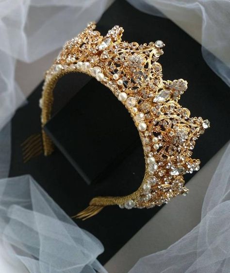 This pearl gold tiara has a luxurious gold color and excellent shine. Tiara is made of the finest materials: crystal beads, pearl beads, rhinestones, metal elements and gold wire. In the photo a crown in decoration: gold + ivory pearls. Crown height in center: Approx. 2.35 (6 cm). Length of Gold Tiara Wedding, Daenys Targaryen, Pearls Crown, Pearl Tiara Wedding, Gold Bridal Tiara, Bridal Crown Crystal, Gold Bridal Crowns, Tiara Gold, Swarovski Tiara