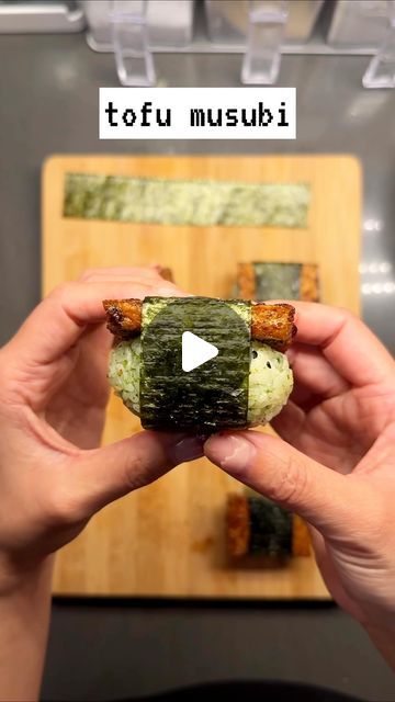 cafe maddy on Instagram: "tofu musubi • I guarantee you this is so yummy!! Enjoy ☺️  The sauce mix in the video is just enough for 1/2 container of extra firm tofu, and I seasoned 1.5 cup of rice with seaweed furikake and a pinch of salt.   I got really inspired by some non-spam musubis I had in Hawaii and I’m really excited to try it with some Korean toppings! Let me know what else I should try next as a musubi topping ☺️  #musubi #hawaii #koreanfusion #korean #tofu #vegetarian #vegan #healthyrecipe" Veggie Musubi, Musubi Recipe, Cup Of Rice, Extra Firm Tofu, Bean Curd, Asian Inspired Recipes, Sushi Rolls, Tofu Recipes, Persimmon