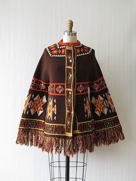 Native American theme 70s poncho 70s Sweater, American Theme, Sweater Poncho, Angel Sleeves, Brass Buttons, Montgomery Ward, Fringe Sweater, Angel Sleeve, Poncho Style