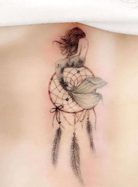 A whimsical dreamcatcher tattoo by @simya_tattoo Tattoo Ideas Female Mermaid, Virgo Mermaid Tattoo, Pin Up Mermaid Tattoo, Tree With Birds Tattoo, Tattoos Mermaid, Tattoos Tree, Tattoos Ocean, Abstract Mermaid, Dreamcatcher Tattoos