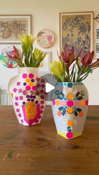 Mini Mad Things on Instagram: "How cool are these cardboard vases from the most awesome book Let’s Make Art! This book includes SO MANY of the coolest art projects, from hats and masks to capes and sculptures. All made with pretty simple art supplies. For this cardboard vase we used an old cereal box, stickers, old paintings punched into circles and flowers and staples. I stock this awesome book, and lots more kids art & craft books, on my website. Book by @letsmakeartuk #recycleandplay #recycledctafts #easycrafts #craftsofinstagram #craftideas #craftersgonnacraft #recycle #play #upcycledartmakecreate" Kids Vase Craft, Vase Crafts For Kids, Cool Vases, Cardboard Vase, Flower Pot Art, Craft Books, Vase Crafts, Upcycled Art, Cool Art Projects