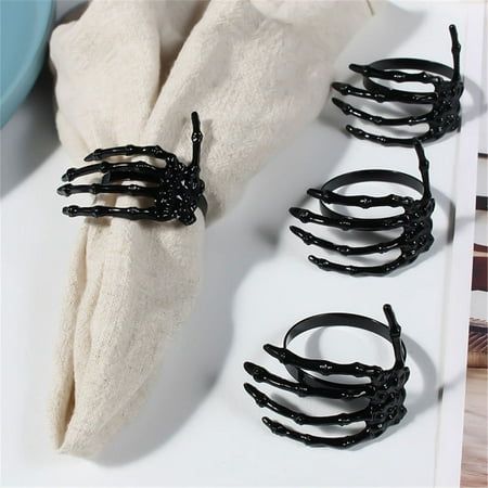 Halloween Party Creative Napkin Storage Ring Napkin Decoration Ring Features: With creative skeleton hand shape design, the napkin ring is perfect for Halloween, Christmas and Thanksgiving party table decoration. What the napkin ring can offer you is that is enough to meet the Halloween decor needs of your warm family or cafeteria. Made of alloy material, it is long lasting. The length of the napkin ring is 5.5cm and the width is 5cm. It is suitable to use in festival, dinner party or banquet. Product Description: Halloween Party Creative Napkin Storage Ring Napkin Decoration Ring Material: Stainless steel Color: as the picture shows, (Due to the difference between different monitors, the picture may have slight color difference. please make sure you do not mind before ordering, Thank you! Halloween Wedding Place Cards, Halloween Wedding Table Settings, Gothic Decorations Party, Halloween Place Settings, Elegant Halloween Tablescape, Gothic Birthday Party Decorations, Halloween Tablescape Elegant, Gothic Wedding Centerpieces, Goth Wedding Decorations