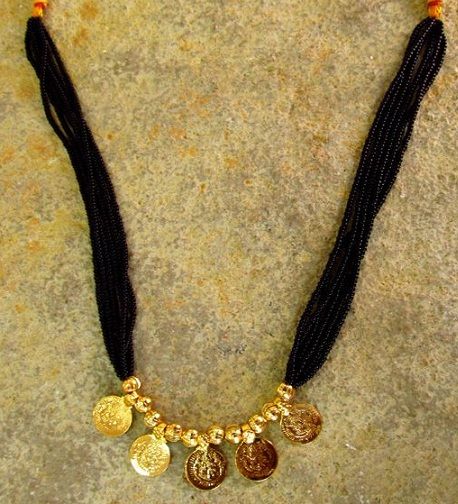 Thick Black bead Chain with Lakshmi Coin Mangalsutra Black Beads Mangalsutra, Black Beads Mangalsutra Design, Gold Jewelry Simple Necklace, Gold Mangalsutra Designs, Beautiful Gold Necklaces, Gold Necklace Indian Bridal Jewelry, Beaded Necklace Designs, Long Pearl Necklaces, Mangalsutra Designs