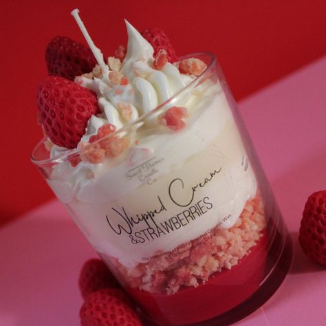 The irresistible mouthwatering scent of Strawberries and Cream. This classic dessert fragrance is sure to remind you of the real thing. Indulge in pure bliss with our Sweet Themes Candle Co. parfait style candles! Each hand-poured, soy wax candle is infused with comforting, phthalate-free oils, and burns clean with a lead-free wick. Packaged in a sleek, recyclable glass container and is carefully packaged and wrapped in a durable paper tube to prevent damage. Makes a perfect gift for any occasion. Light up your life today! Fragrance: Strawberries, Cream, Lemon Peel, Graham Cracker Net wt. 8.5 oz/ 241 g Burn Time: 60 - 84 hrs. Why Choose Sweet Themes Candle Co.? *Comforting room-filling fragrance *Clean burn with lead-free wick *Made with organic phthalate free oils & soy wax  *Little to no Couqutte Candle, Whipped Candles, Strawberry Candles, Valentines Candles, Strawberries Whipped Cream, Valentine Candle, Drink Candles, Strawberry Candle, Biscuits Graham