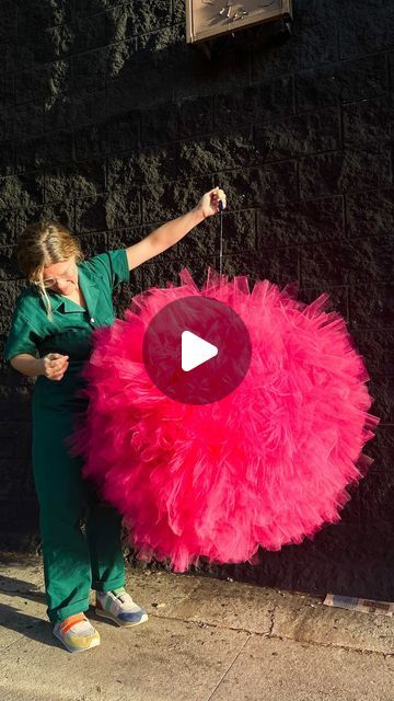 Corrie Sullivan on Instagram: "Process of the pom pom ✨   Used these beautiful tulle poms for a private event ceiling installation at @foxstudiolot 🫶🏻   #CorrieInColor" Tulle Party Decor, Giant Tulle Pom Pom Diy, Tulle Ceiling Draping Diy, Tulle Decor Ideas, Tulle Pompoms Diy, Tulle Projects Diy, Pon Pon Tulle, Pom Pom Curtains Diy, Giant Pom Pom Diy