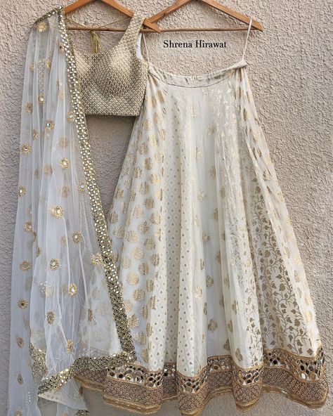 Label Shrena Hirawat on Instagram: “The classic and elegant: Ivory and gold intricate threadwork blouse teamed with multi kali Lehenga and a sheer dupatta✨ . . Dm us or shop…”