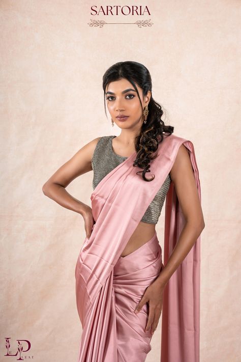 With the Pink Satin Saree, your styling possibilities are endless. Create trendy pleats, experiment with pallu drapes, or add your own twist to traditional styles. Let your saree be an expression of your unique personality! Pink Satin Saree, Blouse Styling, Satin Sarees, Saree Fancy, Glitter Blouse, Silver Blouse, Saree Draping Styles, Fancy Sarees Party Wear, Satin Saree