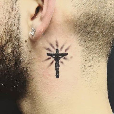 Cross neck tattoos are one of the most popular choices out there and they have a strong religious meaning as it reminds everyone that your religion is the most important thing in your life. White Tattoo Cross, Christian Cross Tattoos, Cross Tattoo Neck, Small Cross Tattoos, Small Cross Tattoo, Best Neck Tattoos, Small Neck Tattoos, Side Neck Tattoo, Cross Tattoos For Women