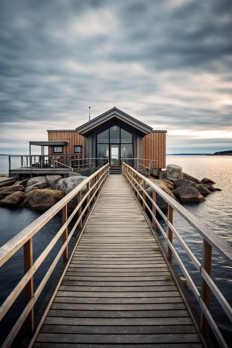 This stunning island cabin in the Finnish archipelago has modern wooden architecture combined with a traditional cottagecore look. Large windows facing the pier showcase the interior design. Outside the water reflects the clouds creating a beautiful atmosphere. Pier Design, Wooden Architecture, Little Cabin, Archipelago, Large Windows, The Clouds, Cabin, Interior Design, Architecture