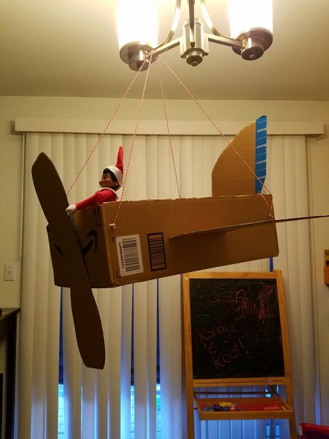 2016 - Elf on the Shelf Cardboard Airplane #elfontheshelf Elf On The Shelf Plane Ideas, Elf Airplane Ideas, Elf On The Shelf Airplane Arrival, Elf On The Shelf Paper Airplane, Elf On The Shelf Arrival Paper Airplane, Elf On The Shelf Airplane, Elf On The Shelf Departure Ideas, Elf Airplane, Elf On The Shelf Dropping Out Of An Airplane