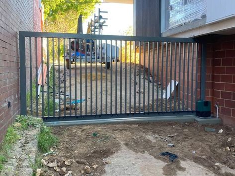 Western Automate recently completed this job in📍Beaconsfield, Western Australia. Aluminium custom square tubular sliding vehicle gate. Automated with only the best Centsys D5 Evo Sliding Gate Motor. ❗This gate retracts into the wall! 👀 See the next post of the video! 🎨 Powder coat colour is Woodland Grey Satin ☎️ Contact us today for a free, no-obligation quote ! Sliding Gate Motor, Gate Motors, Security Gates, Sliding Gate, Powder Coat Colors, House Architecture, House Architecture Design, Western Australia, Architecture House