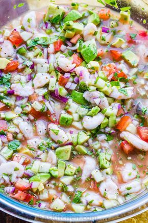 Ceviche is loaded with shrimp, avocados, tomatoes and cucumbers; all marinated in fresh lime juice. You can use cooked or raw shrimp in this Mexican shrimp cocktail. #ceviche #cevicherecipe #shrimpceviche #howtomakeceviche #mexicanceviche #appetizer #salsa #shrimp #avocado How To Make Shrimp Ceviche, Ceviche Shrimp Recipe, Cevechi Recipe, Shrimp Ceviche Recipe Mexican Authentic, Shrimp Cerviche, Seafood Ceviche Recipe, Ceviche Cocktail, Civeche Recipe, Fish Ceviche Recipe