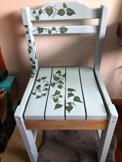 This old chair was plain wood. Ive painted it pale blue with a beautiful vine running over it. Something different 😁 Chair Painting Ideas Wood, Hand Painted Bar Stools, Painting On Chair, Wood Chair Paint Ideas, Painted Chairs Ideas Inspiration, Painted Chair Ideas, Chair Painting Art, Painting Wooden Chairs, Painted Chairs Ideas