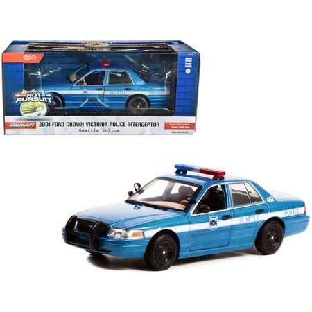 Brand new 1/24 scale diecast car model of 2001 Ford Crown Victoria Police Interceptor Blue Metallic "Seattle Police - Seattle, Washington" "Hot Pursuit" Series die cast model car by Greenlight. Limited edition. Chrome accents. Real rubber tires. True-to-scale detail. Has opening front doors. Detailed interior, exterior. Officially licensed product. Made of diecast with some plastic parts. Manufacturer's original unopened packaging. Dimensions approximately L-9, W-3.5, H-2.75 inches. Seattle Police, Crown Victoria Police Interceptor, Toy Police Cars, Boondocks Drawings, 2006 Ford Mustang, Uk Police, Chevy Stepside, Hot Pursuit, Police Truck