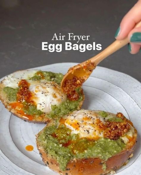 Air Fryer Egg Bagels 🍳🥯 by @healthymoodsf This is such a fun way to use up your bagels! You can use any toppings you desire—cheese, chopped veggies, etc. So easy and so delicious! Ingredients: Bagel Eggs Olive oil Parmesan cheese Pesto Salt to taste Pepper to taste Directions: Cut the bagel in half. Make a hole a little bigger to make it easier to drop the egg. Add bagels to an air fryer. Add in egg and toppings. Air fry at 400F for 8-10 minutes or more for over medium or over-hard eggs.... Egg Bagels, Sailor Bailey, Egg Bagel, Chopped Veggies, Nourishing Recipes, Pesto Cheese, High Fat Foods, Fat Foods, Chili Oil