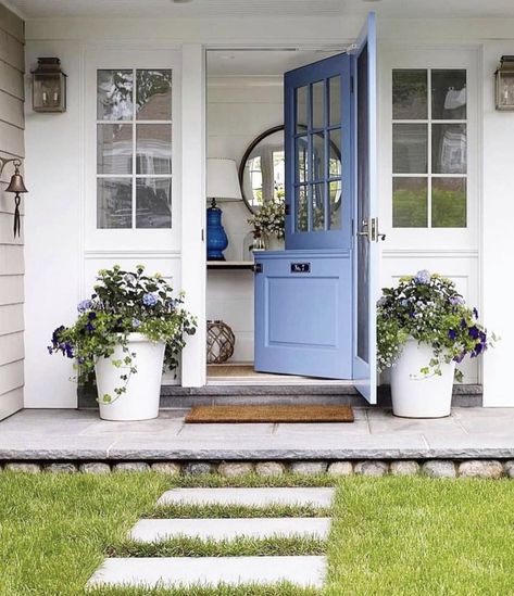 A pop of color can make a big impact! This shade of blue is a really nice choice for this beautiful dutch door, and brings a bit of wow-… Exterior Entryway Ideas, Shutters Repurposed Decor, Pintu Ganda, Blue Front Door, نباتات منزلية, Farmhouse Front Door, Dutch Door, Farmhouse Front, Front Door Colors