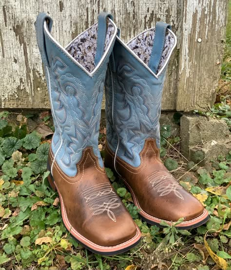 Style number: 5895. Blue leather upper. Tan leather foot. Pull on tabs. Western embroidery on shaft. 11 inch shaft height. White piping. Square toe shape. Removable ortholite insole. Cowboy approved II outsole. Stockman heel type. 1 1/2 inch heel height. Flat Toe Boots, Laredo Boots Women, Tony Lomas Boots, Women’s Square Toe Cowboy Boots, Square Toed Cowgirl Boots, Ariat Boots Square Toe, Jeans And Cowboy Boots Outfit, Western Wedding Boots, Western Heels