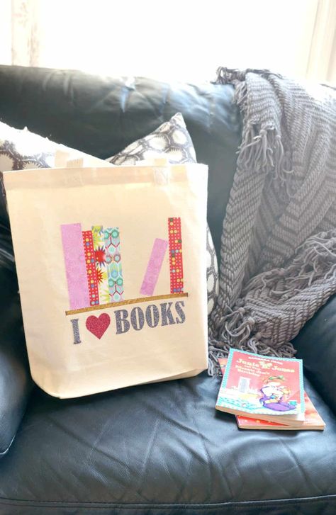 I Love Books Library Book Bag . Learn how to use fabric and vinyl scraps to make a custom DIY book bag. Perfect for school or trips to the library. #books #bag #diy #totebag #vinyl Book Bag Ideas, Book Bags For Kids, Library Book Bag, Library Tote, Books Library, Glitter Heat Transfer Vinyl, Library Bag, Love Books, Unique Diy Gifts