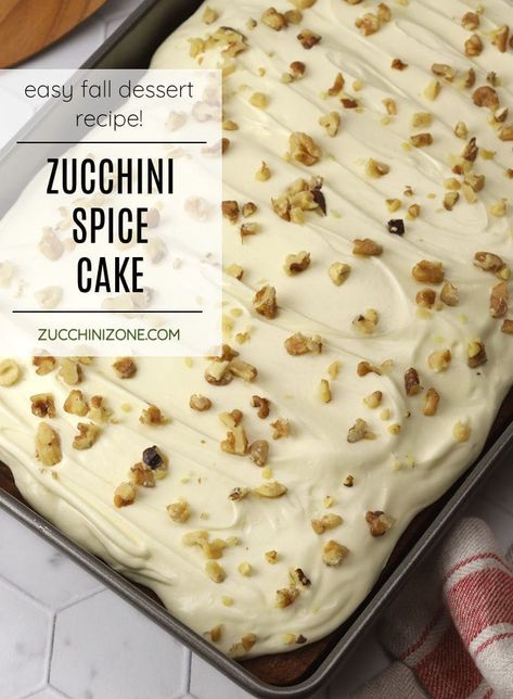 Zucchini spice cake recipe by Zucchini Zone. Zucchini spice cake is filled with shredded zucchini and cozy fall spices for the most tender and moist sheet cake. Topped with velvety cream cheese frosting and chopped walnuts, this will be your new go-to fall cake recipe. #zucchinicake #zucchinispicecake #spicecake #falldesserts #fallcake #autumn #recipe #homemade #creamcheesefrosting Zucchini Spice Cake With Cream Cheese Frosting, Zucchini Spice Cake Recipe, Zucchini Spice Cake, Spice Cake Mix Zucchini Bread, Recipes With Shredded Zucchini, Zucchini Cake With Cream Cheese Frosting, Glazed Lemon Zucchini Bread Recipe, Fall Cake Recipes, Spiced Zucchini