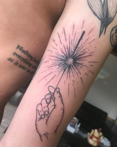 Awesome linework sparkler tattoo on the arm Sparkler Tattoos, Sparkler Drawing, Sparks Tattoo, Spark Tattoo, Firework Tattoo, Paramore Tattoo, Timeless Tattoo, Elements Tattoo, Upper Arm Tattoos