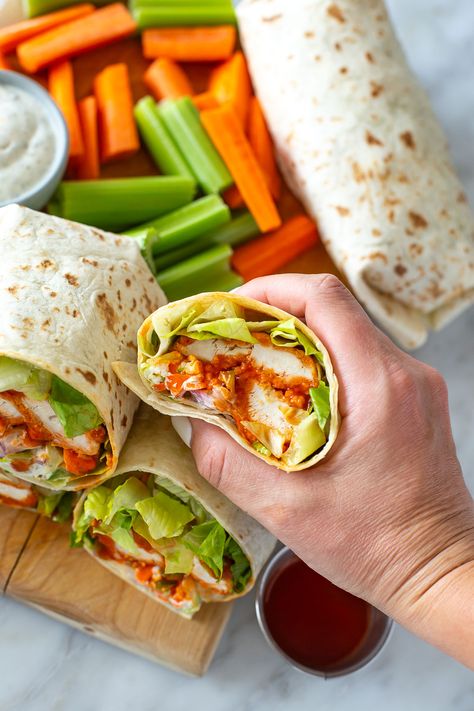 This is truly the BEST Buffalo Chicken Wrap you'll ever eat, with the crispiest baked chicken tenders coated in sauce. It's my fave lunch! Protein Buffalo Chicken Wrap, Buffalo Chicken Wrap, Buffalo Chicken Wraps, Baked Chicken Tenders, Crispy Baked Chicken, Chicken Wrap, Chicken Wraps, Buffalo Chicken, Chicken Tenders