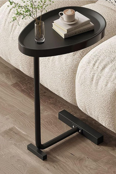 This sofa side table has has a C shaped design, which has a small space and is easy to move, making it easy to move to the desired position. It can easily slide on the bottom of the sofa, sofa, or bed, saving you space. This C shaped dining table is made of sturdy and durable metal, and the surface wood grain is not easy to scratch. Unique egg shaped appearance, smooth edges, simple and luxurious style, suitable for any style of decoration. Adds an extra bit of polish to your room. C Shaped Tables, C Shaped Side Table Living Rooms, C Shaped End Table, Mini Coffee Table, C Shaped Side Table, Side Table Decor Living Room, Edges Simple, Side Sofa Table C Shape Black, C Tables For Couch 26”