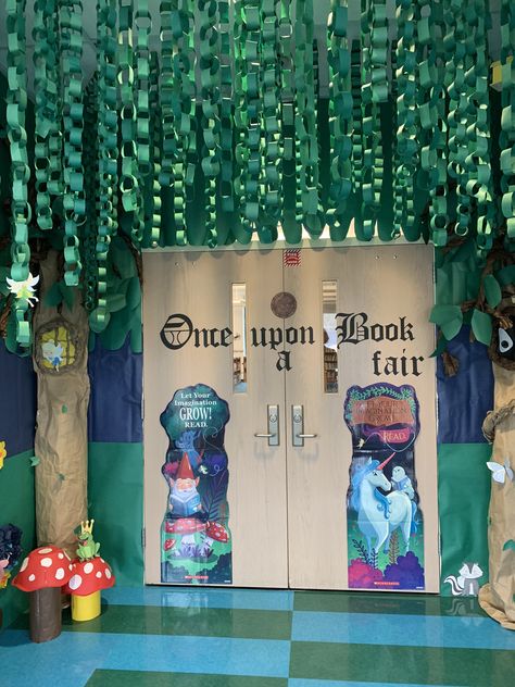 Forest Hallway School, Robin Hood Classroom Door, Fairy Tale Ball Decorations School, Fairytale Summer Camp, Scholastic Book Fair Bulletin Board, Enchanted Forest Theme Book Fair, Story Book Decorating Ideas, Scholastic Book Fair Decorations, Enchanted Forest Hallway Decor