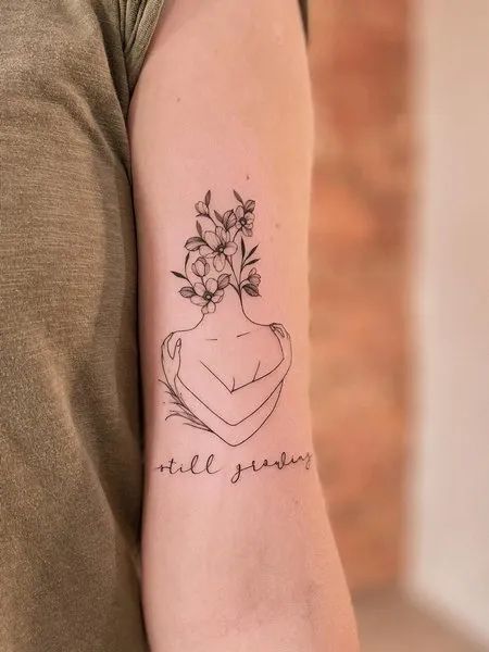 Minimalist Self Love Tattoo Self Love Flower Tattoo, Tattoos That Symbolize Self Love, Love Tattoo On Hand, Self Love Tattoos, Bible Quote Tattoos, Love Tattoo Ideas, Self-love Tattoo Ideas, Love Heart Tattoo, Empowering Tattoos