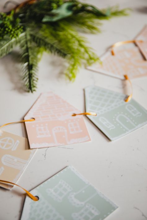 DIY Paint Chip Gingerbread House Garland for FREE – Casa Watkins Living Crafts With Paint Chips, Crafts With Paint Samples, Gingerbread Garland Ideas, Christmas Happies, Gingerbread House Garland, Paint Chip Cards, Paint Sample Cards, Paint Chip Crafts, Ginger Bread House Diy