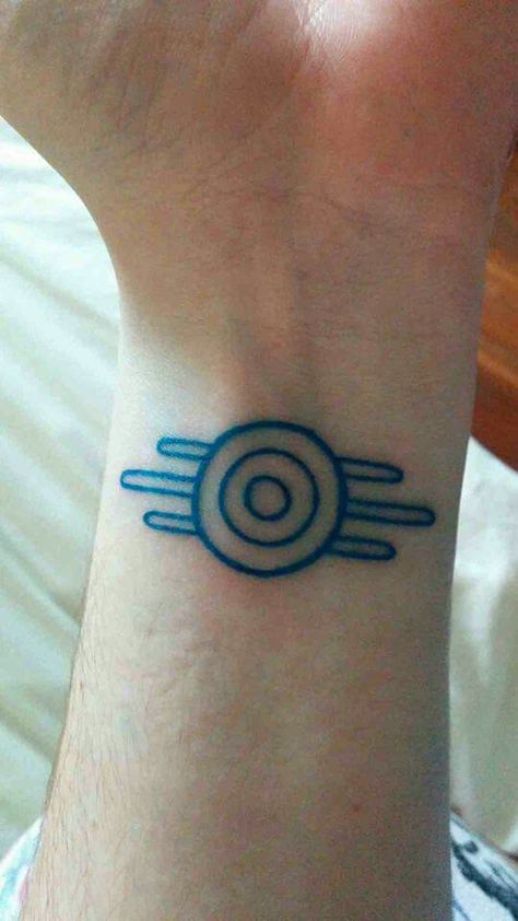 Fallout tattoo Vault Tec Logo, Fallout Tattoo, Fallout Cosplay, Nerd Tattoo, Vault Tec, Dainty Tattoos, Subtle Tattoos, Bioshock, Dope Tattoos