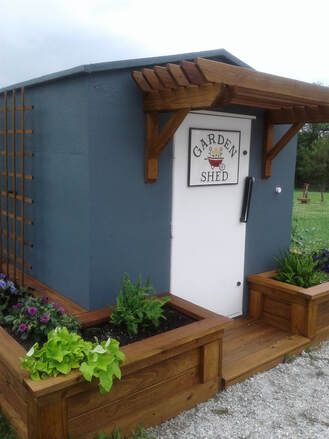 Storm Shelters For Your Family - Safe Sheds, Inc. Tornado Bunker Storm Shelters, Safe Rooms In Houses Storm Shelters, Storm Shelter Ideas Decor, Tornado Shelter In House, Storm Shelter Landscaping, Diy Storm Shelter, Storm Shelter Ideas, Above Ground Tornado Shelter, Tornado Room