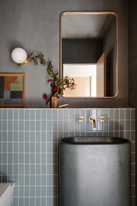 Tour Brian and Jessie De Lowe’s Montecito Ranch Home | domino Small Powder Toilet Design, Powder Toilet Design Modern, Powder Room Mid Century Modern, Terracotta Powder Room, Fireclay Tile Bathroom, Earthen Interiors, Modern Small Powder Room, Powder Room Tiles, Tiled Powder Room