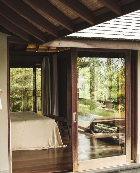 Rumah Hujan, Ubud Villa, Bali on Instagram: ““No one is ever satisfied where he is....Only the children know what they’re looking for....” ⁠ ― Antoine de Saint-Exupéry⁠ ⁠ #rumahhujan⁠…” Ceiling With Beams, Ubud Villas, Glass Sliding Door, Wooden Sliding Doors, Deck Flooring, Villa Bali, Bali House, Wooden Ceilings, Garden Bedroom