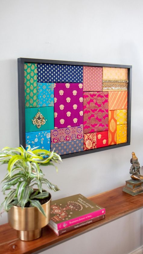 Mitesh | Home & Design | I’m a bit of a hoarder when it comes to fabric scraps always thinking I’ll use it for a project. From saree blouse piece remnants to old… | Instagram Cloth Framed Wall Art, Wall Decor With Fabric, Fabric In Frames Wall Art, Interior Canvas Painting, Saree Decoration Ideas On Wall, Indian Decoration Ideas House, Fabric Recycling Ideas, Fabric Wall Decor Diy, Fabric Wall Art Ideas