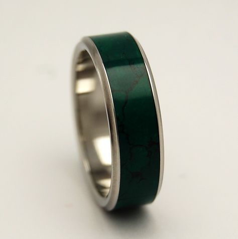 Glowing green wonder. Imperial Jade is centered between two flared titanium edges. In gemstone therapy it is said that jade 'stimulates creativity and mental agility', while also having a balancing an Glow Rings, Wedding Rings Titanium, Pretty Wedding Rings, Imperial Jade, His Ring, Unique Wedding Rings, Rings Mens, Titanium Wedding Rings, Men's Wedding Bands