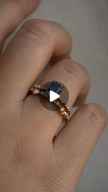 Laurie Fleming on Instagram: "A treasure from the ocean depths🧜‍♀️Richest blues swirling within a cushion cut sapphire upon this bespoke Ilona Ring. Paired here with the bubbling diamonds of our White Wisp Band—lifting her up above the waves🌊" Laurie Fleming, Cushion Cut, The Ocean, Instagram A, Wedding Ring, Swirl, Bespoke, Sapphire, Wedding Rings