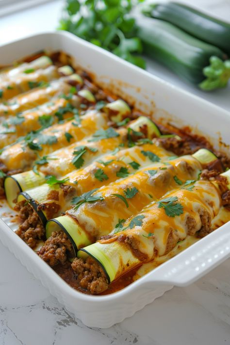 Mouthwatering Ground Beef Keto Enchiladas with Zucchini: A Healthy Twist on a Classic Recipe #ketodiet #ketorecipes #lowcarb Zucchini Boats Enchilada, Zucchini Enchiladas Beef, Keto Ground Beef Enchiladas, Enchiladas Ground Beef, Keto Enchiladas, Low Carb Enchiladas, Zucchini Enchiladas, Low Glycemic Recipes, Ground Beef Enchiladas