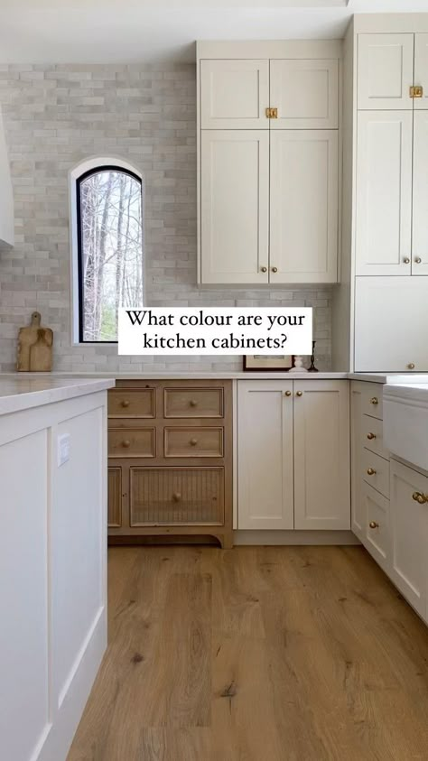 Linen Colored Kitchen Cabinet, Light Cream Cabinets Kitchen, Greige And White Oak Kitchen, Beige Cream Kitchen Cabinets, Benjamin Moore Cabinets Colors, White Or Cream Kitchen Cabinets, Benjamin Moore Feather Down Cabinets, Cream Flat Panel Kitchen Cabinets, Ivory Shaker Kitchen Cabinets