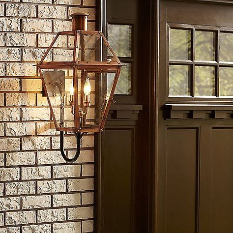 The Quoizel Rue De Royal Outdoor Wall Sconce preserves the timeless look of gas lighting without the hassle of a propane feed. Made of solid copper, the sturdy frame supports clear glass shades. It is also complemented with hand riveting for a little bit of a personal touch. Classics never go out of style, and neither will your outdoor living space with the romantic reproduction of the antique gas light. Exterior Lanterns, Patio Ceiling, Gas Lighting, Copper Wall Light, Outdoor Lighting Design, Antique Lanterns, Copper Lantern, Outdoor Lighting Ideas, Aged Copper