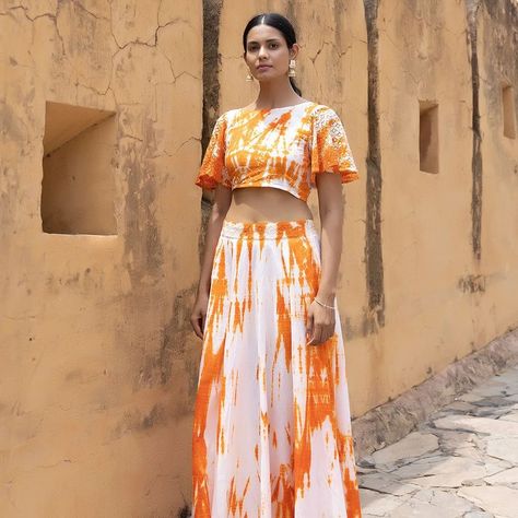 Dance through summer days in our Ruby Orange Tie-Dye Top Skirt Set ❤️ Embrace the joy of the season with this lively ensemble, featuring a trendy tie-dye crop top with charming net sleeves and a back tie detail, paired with a graceful flared skirt 💕😍 Shop Now www.ragavi.in #ragavi #ragavijaipur #womenwear #westernwear #indianfashion #skirtset #tiendyedress (Ragavi, Women Wear, Western Wear, Jaipur, Indian Wear, Comfy Wear, Tie and Dye Outfit) Net Sleeves, Comfy Wear, Orange Tie, Tie Dye Crop Top, Top Skirt Set, Tie And Dye, Flared Skirt, Indian Wear, Western Wear