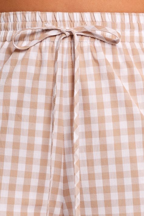 DETAILS Tuck your essentials into the handy side pockets and enjoy the playful touch of the gathered frill hem. Whether you're dressing up for brunch or enjoying a casual day out, the striking gingham print makes these pants a statement piece that invites compliments and turns heads. full length pant wide leg cut high rise design elasticised waist band with adjustable tie feature functional side pockets gathered frill hem gingham print lined material - 100% cotton SIZING studio model is 165cm an Beige Gingham, Gingham Print, Waist Band, No Frills, Dressing Up, Print Making, Gingham, Full Length, High Rise