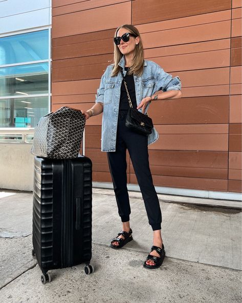 My Favorite Airport Outfits & Travel Essentials for Jetsetters - Fashion Jackson, Denim Shacket, black joggers, Chanel dad sandals, Amazon essentials hardshell suitcase Joggers And Shirt Outfit, Denim Shaket Outfits, Denim Shaket Jacket Outfit, Oversize Denim Shirt Outfit, Denim Shirt Jacket Outfit, Chanel Sandals Outfit, Chanel Dad Sandals Outfit, Black Joggers Outfit Casual, Oversized Denim Shirt Outfit