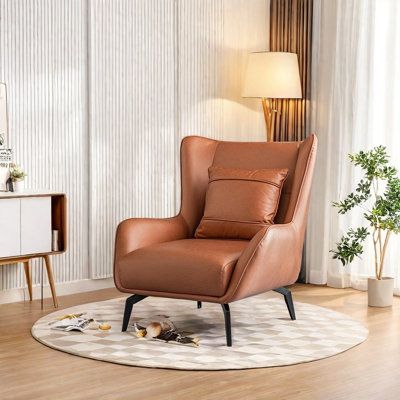 This chair features a high-resilience sponge cushion that is moderately firm, providing strong rebound and a comfortable sitting experience with excellent support, preventing sagging. The outwardly designed armrests offer a spacious seating area, and the soft, elastic wrapping provides full-body relaxation. The widened backrest offers comfortable support, while the reinforced metal support legs ensure stability, strong weight-bearing capacity, and durability. Orren Ellis Fabric OR Leather Type: High Back Accent Chairs, High Back Chairs, Living Room Furniture Chairs, Accent Chairs For Living Room, Living Room Inspo, Orren Ellis, Accent Chair, Seating Area, Orange Yellow