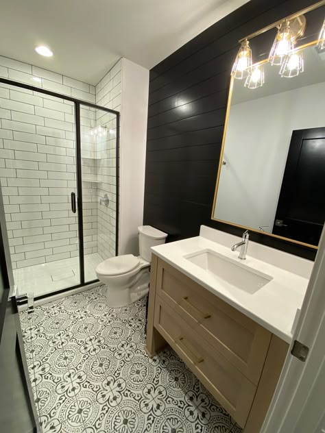 Bathroom With Black Shiplap, Black White Guest Bathroom, Modern Farmhouse Bathroom Gold Fixtures, Black White And Bronze Bathroom, Bathroom Black Shiplap, Shiplap Bathroom Black, Black White And Oak Bathroom, Black Shiplap Bathroom Accent Wall, Black Framed Shower Door