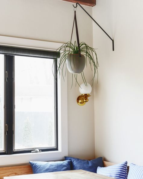 A corner dining nook with oak wood and navy throw pillows | via Yellow Brick Home Hanging Plant Hooks, Fake Potted Plants, Wall Hanging Decorations, Plant Bracket, Yellow Brick Home, Indoor Plant Wall, Wall Plant Hanger, Wooden Wall Hooks, Plant Hooks