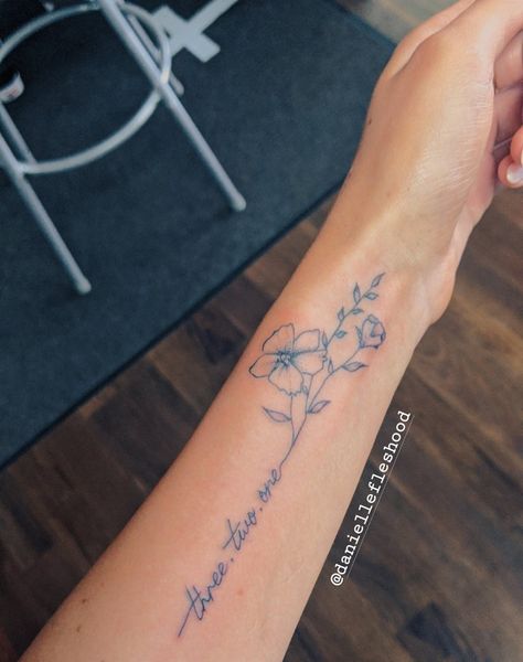 Tattoo With Writing And Flowers, Floral Tattoo Design With Words, Simple Flower Tattoo With Words, Flower Stem Quote Tattoo, Quote In Flower Tattoo, Tattoo Flower Stem Words, Writing Tattoos With Flowers, Flower Stem Into Words Tattoo, Writing With Flower Tattoo