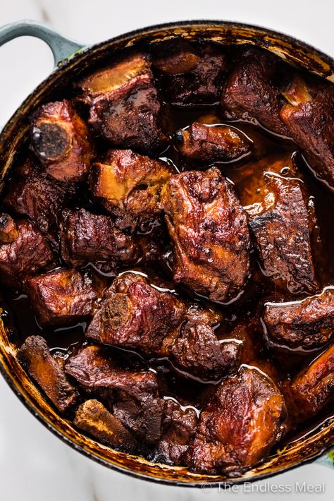 These braised pork ribs are as good as it gets. They're slow-cooked in a ridiculously delicious sauce made with dark beer and chocolate that, by the time the ribs have finished cooking, becomes the best gravy you'll ever try. #theendlessmeal #braisedporkribs #braisedribs #ribs #porkribs #braised #slowcookedribs #dinner #pork Pork Rib Stew Recipe, Tomahawk Pork Chop Recipe, Braised Ribs, Braised Pork Ribs, Slow Cooked Ribs, Dinner Pork, Slow Cooked Pork, Baked Ribs, Juicy Pork Chops