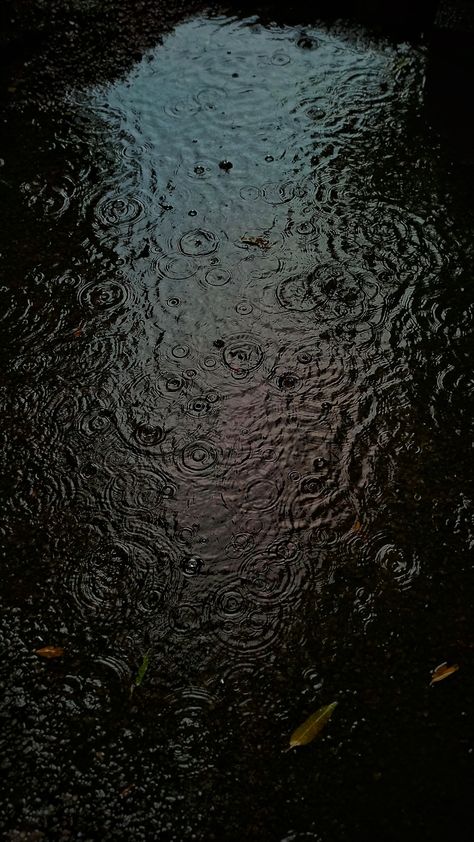 Rain drops creating a ripple pattern in a puddle Rain Puddles Aesthetic, Puddle Aesthetic, Reflection In Puddle, Puddle Photography, Siren Witch, Water Droplets Photography, Puddle Reflection, Jewellery Moodboard, Water Puddle